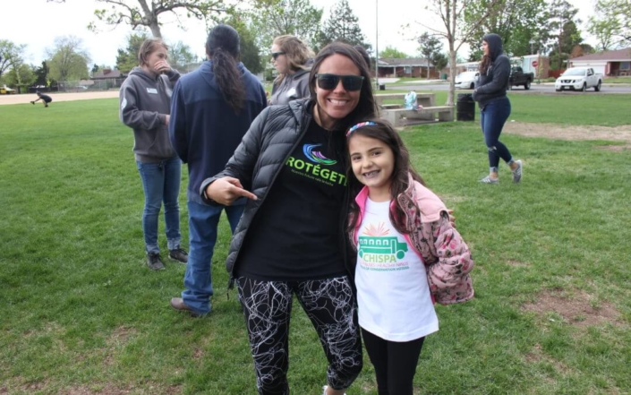 Conservation Colorado Field Organizer Finangi with her daughter celebrating CO Public Lands Day