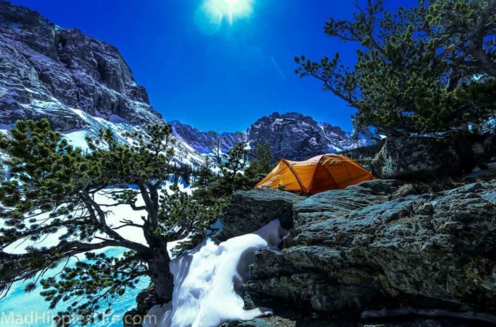 Tent set up in a mountain landscape.