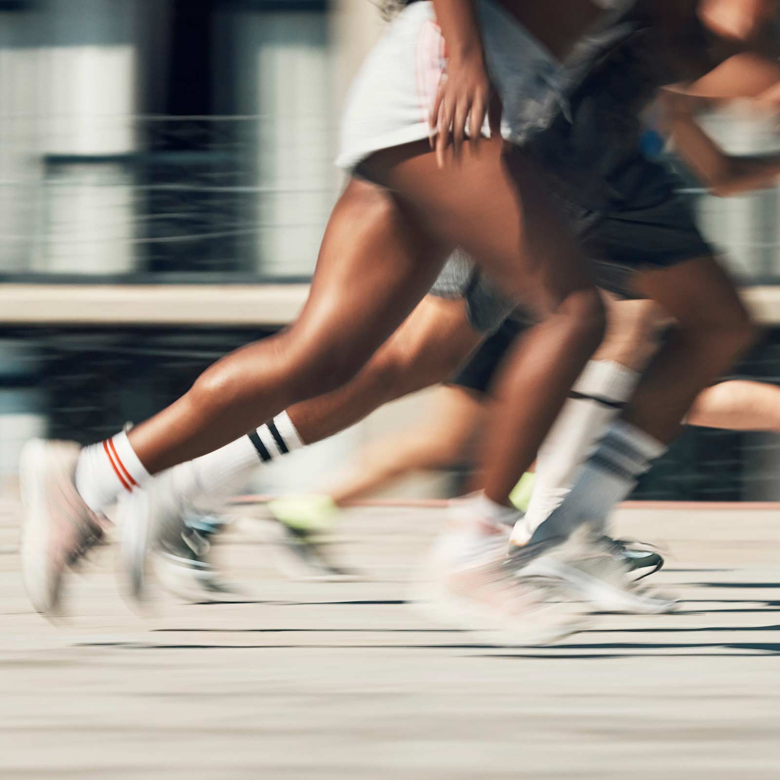 Photo of runners' legs in a race