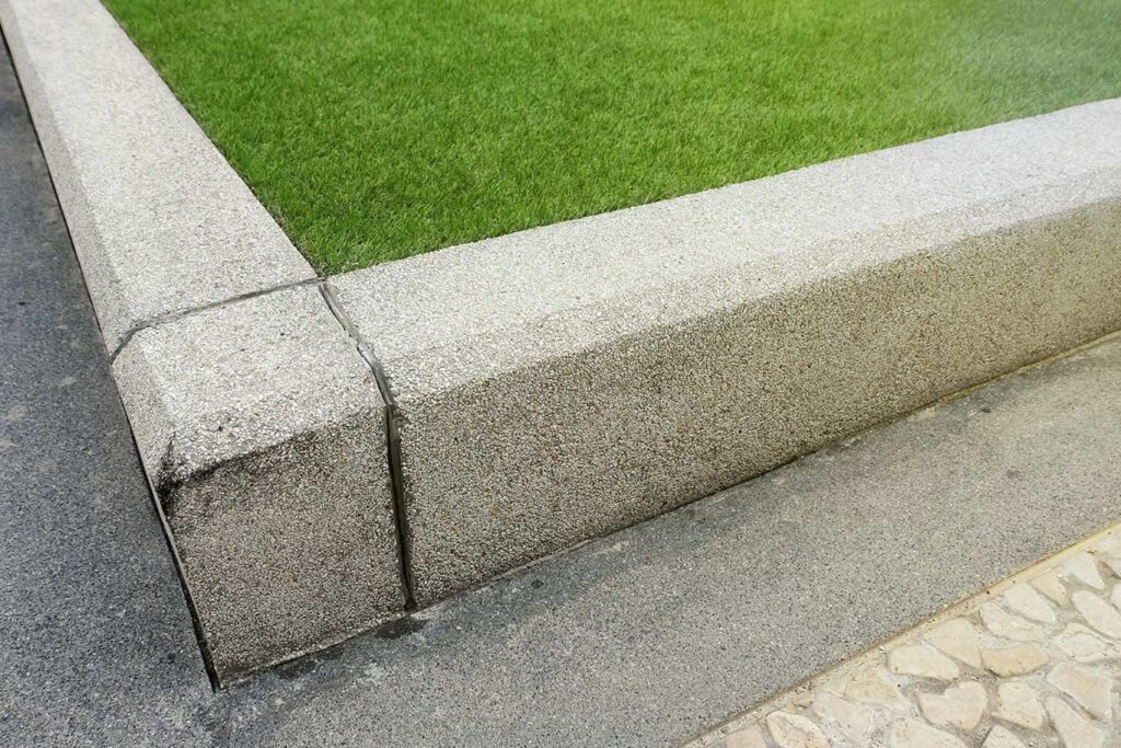 Photo of concrete edge by turf