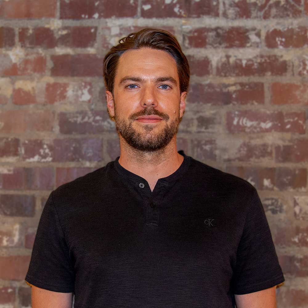 Headshot for Ben Simpson