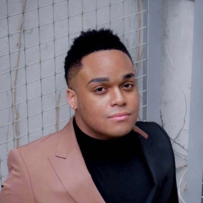 Headshot for Kennedy-Ezra Kastle